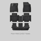 Set of black heavy-duty rubber floor mats for a 7-seat LHD vehicle.
