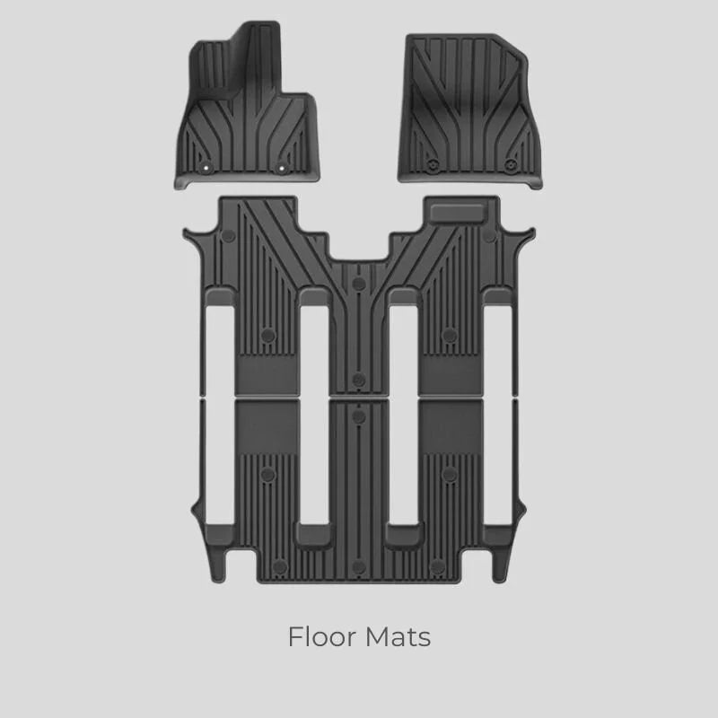 Custom-fit black TPE all-weather floor mats set with deep grooves for car interior protection