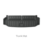 Black heavy-duty TPE rubber trunk mat with raised edges for custom fit protection.