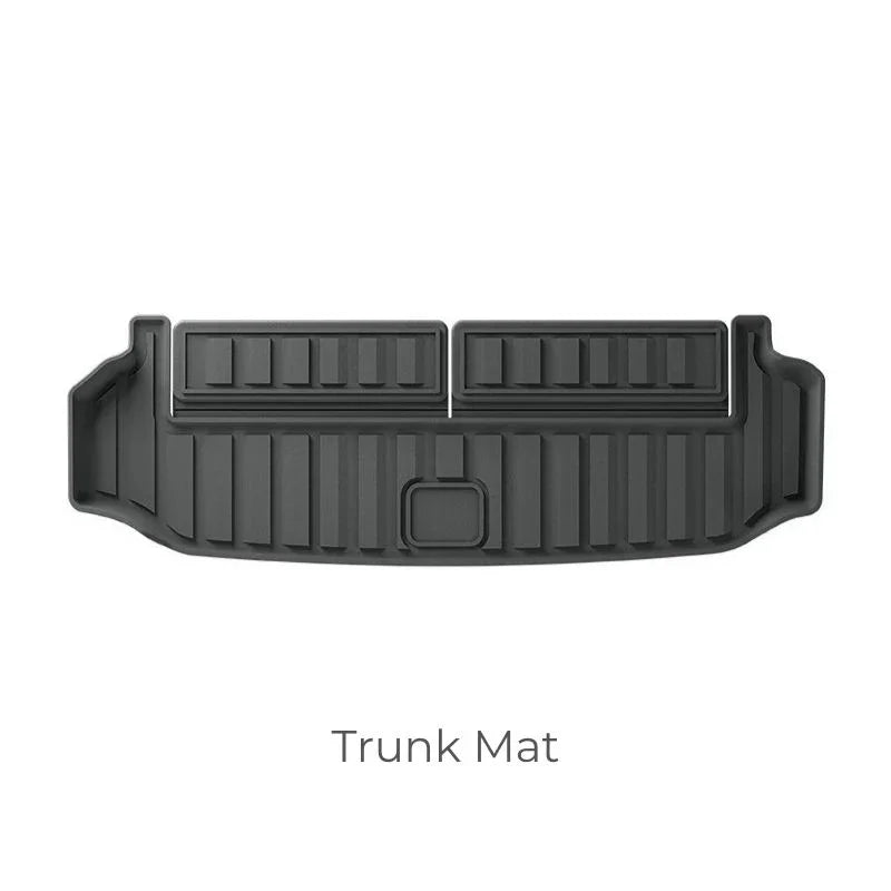 Black heavy-duty TPE rubber trunk mat with raised edges for custom fit protection.