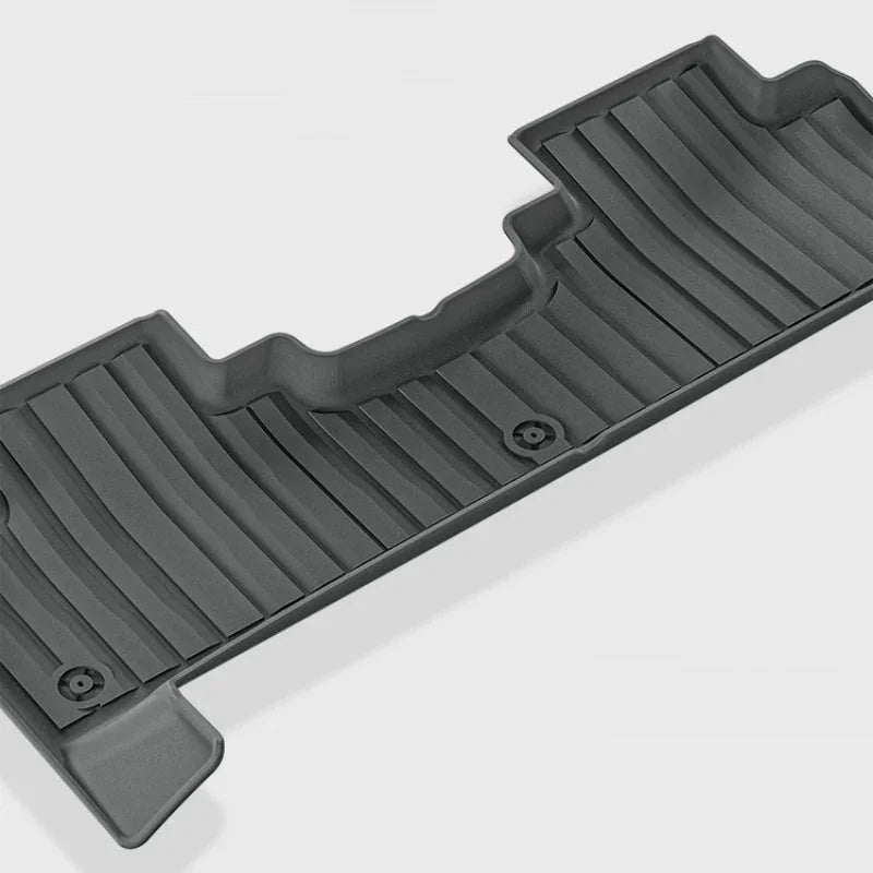 Durable grey TPE rubber car floor mat with anti-slip ribbed texture for custom fit protection.