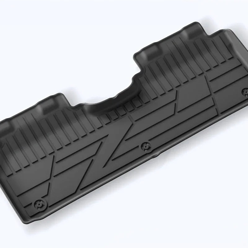 Durable black heavy-duty rubber floor mat designed for vehicle protection against spills and wear.