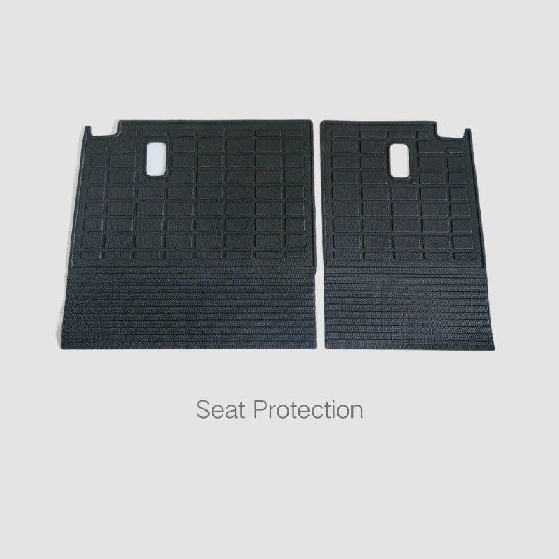 Black heavy-duty rubber seat protection covers for BYD vehicles.