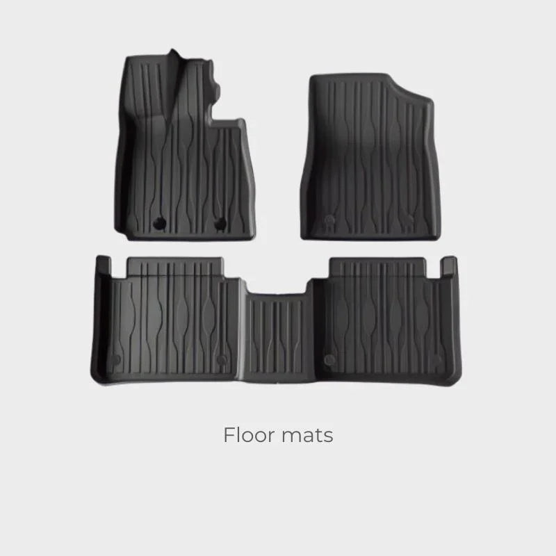 Black heavy-duty TPE car floor mats set with custom-fit textured ridges for durability.