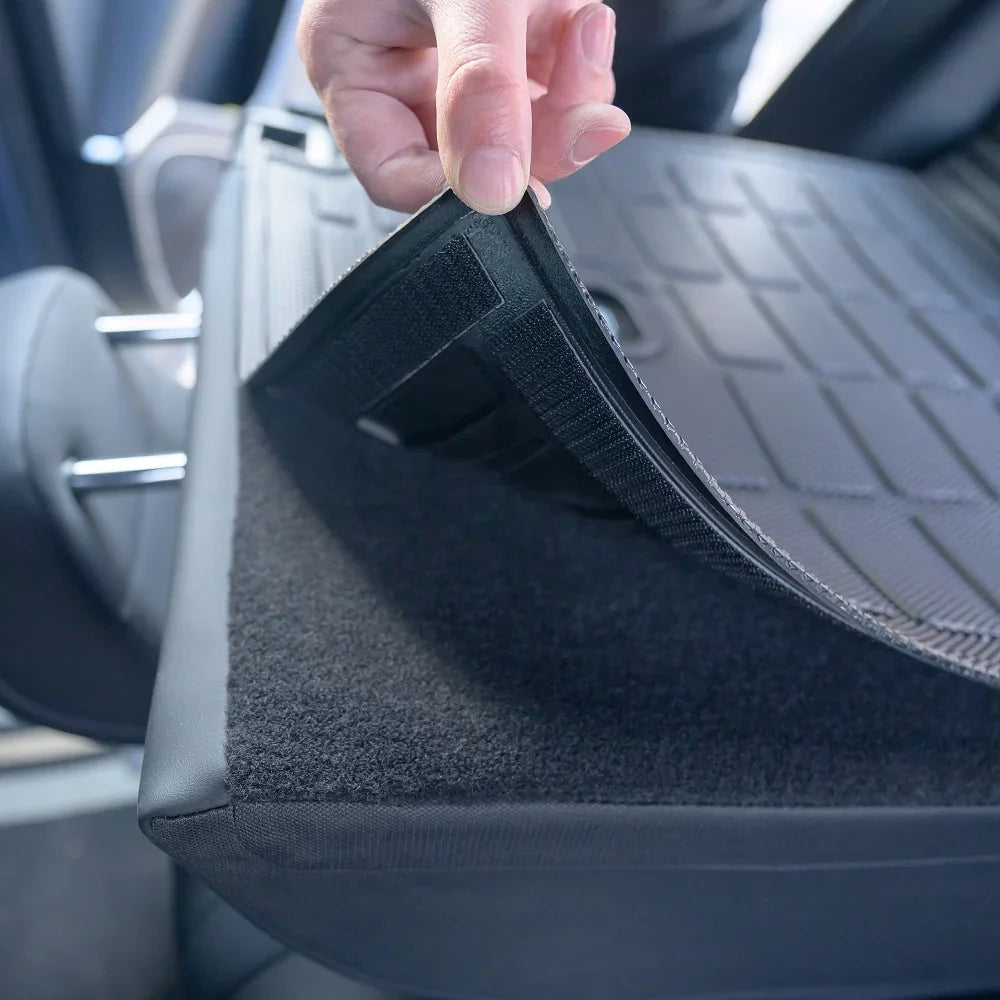 Black heavy-duty TPE car trunk mat with textured anti-slip surface and durable waterproof material.