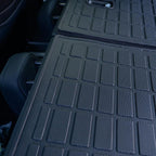 Black textured TPE waterproof trunk mat with anti-slip grid design for BYD car protection.
