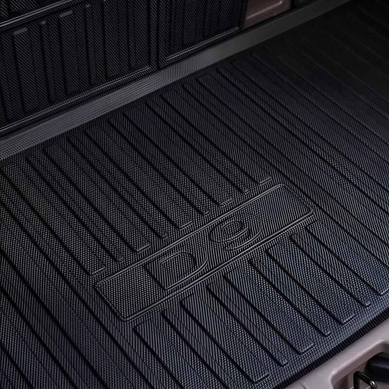 Black heavy-duty textured rubber trunk mat with anti-slip ribbed design for BYD protection.
