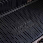 Black heavy-duty textured rubber trunk mat with anti-slip ribbed design for BYD protection.