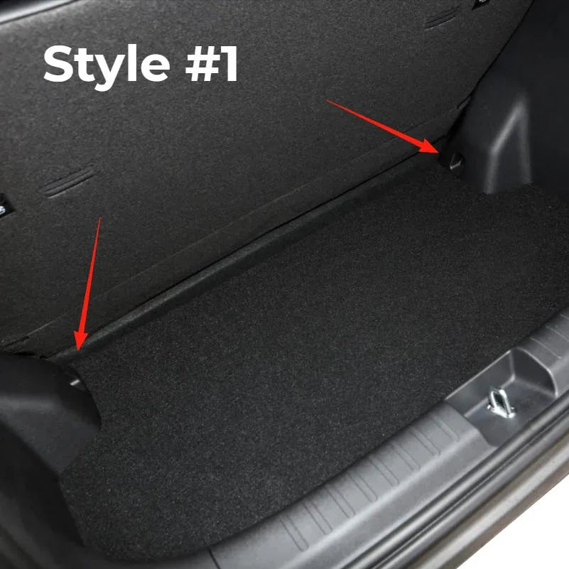 Black heavy-duty carpet trunk mat for car cargo protection, featuring a durable textured material.