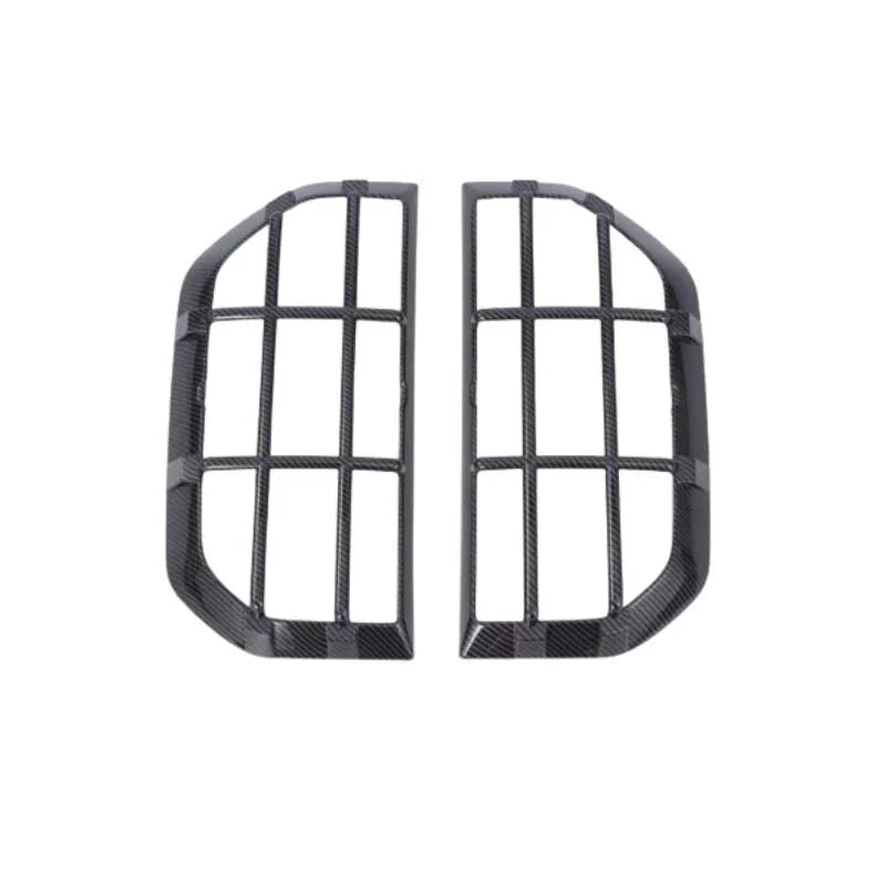 Black carbon fiber texture car grille trim accessories for BYD models.