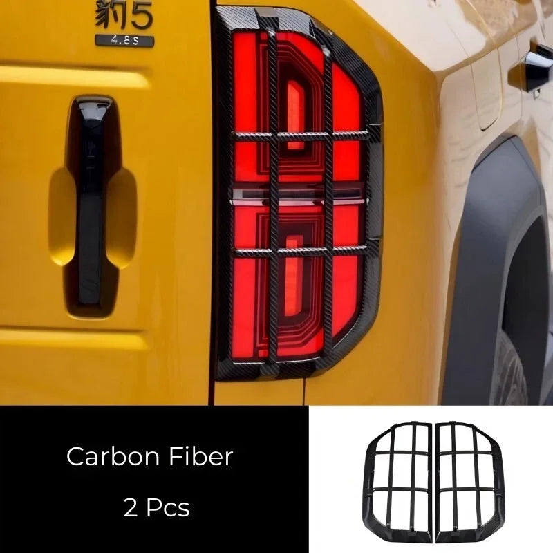 Black carbon fiber tail light protector guards for BYD, set of 2 pieces.