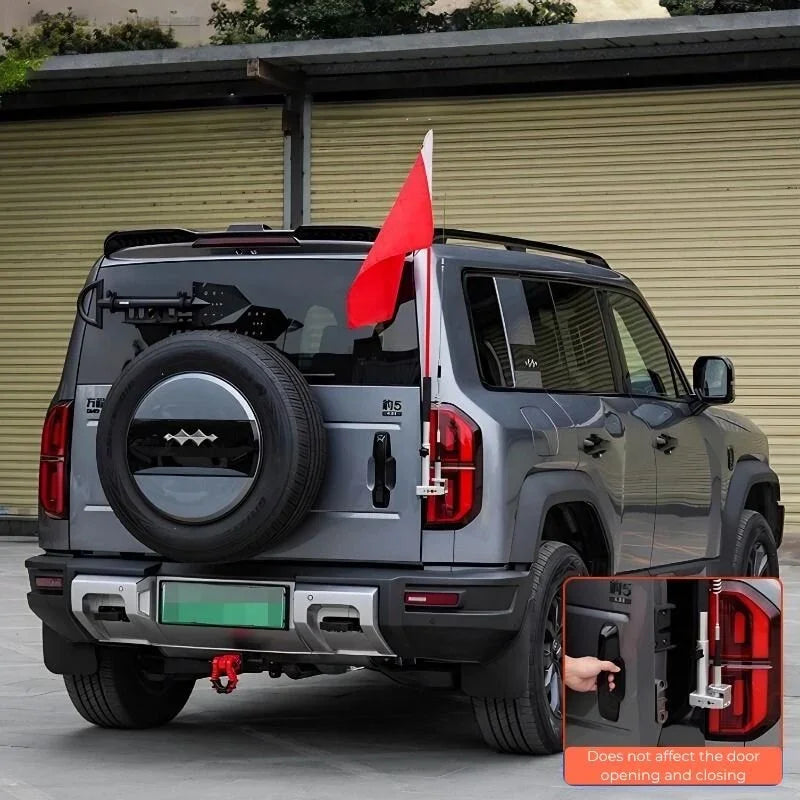 Silver BYD SUV with a red and white off-road flag mounted on a durable metal bracket.