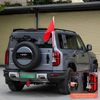 Silver BYD SUV with a red and white off-road flag mounted on a durable metal bracket.