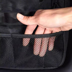 Black mesh storage pocket made of durable fabric for car organizer accessories.