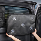 Black heavy-duty fabric car seat organizer with clear suction cups for easy mounting.