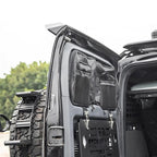 Black heavy-duty fabric organizer bags with mesh pockets mounted on a vehicle rear door.