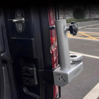 Silver aluminum alloy bike rack mount accessory installed on a black vehicle rear