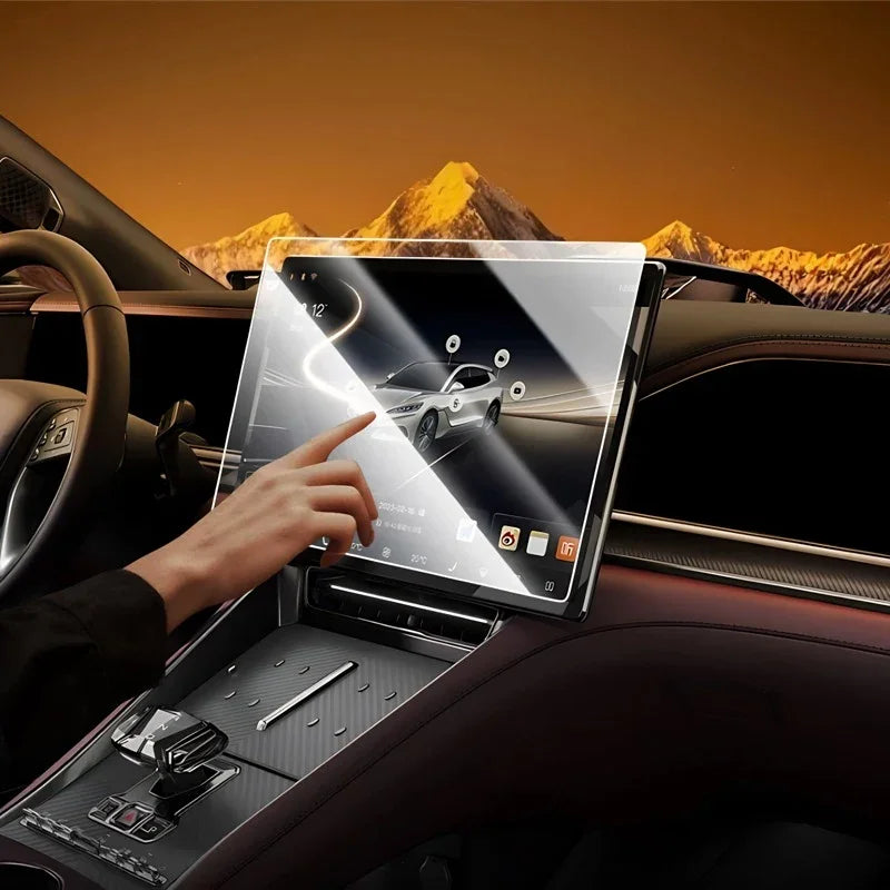 Clear tempered glass screen protector applied to a car infotainment touchscreen display.
