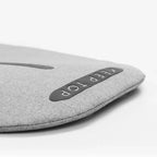 Close-up of a light grey fabric car accessory featuring a dark grey 'KEEP TOP' embroidered patch.