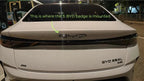 Rear view of a white BYD Seal showing the mounting position for a custom 3D chrome badge.