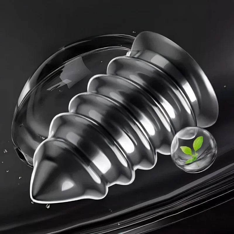 High-gloss liquid metal texture with a protective clear coating and organic green leaf accent.