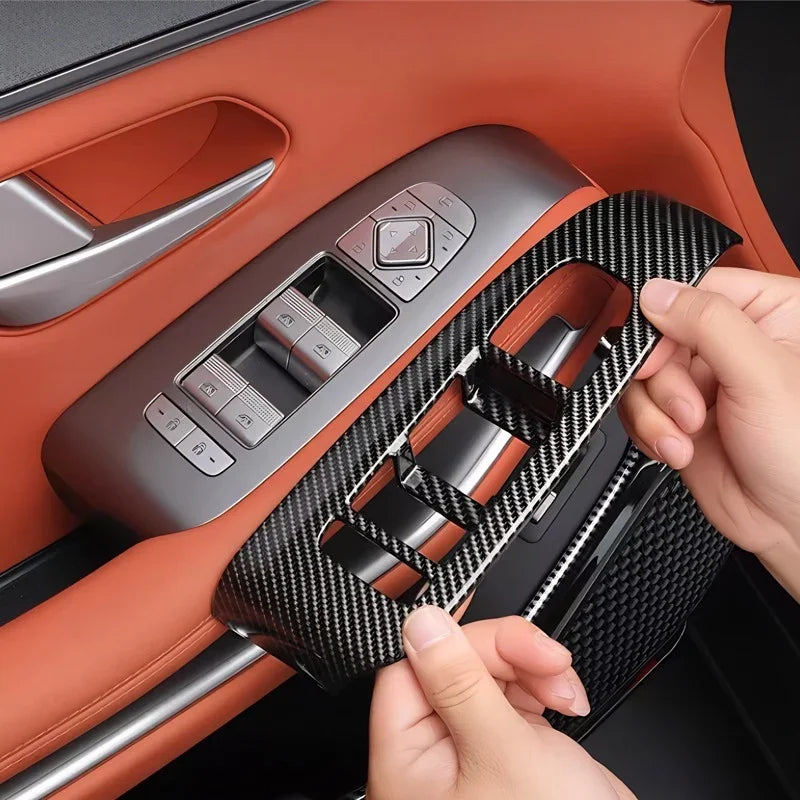 Carbon fiber pattern door trim panel in black for BYD car interior enhancement.