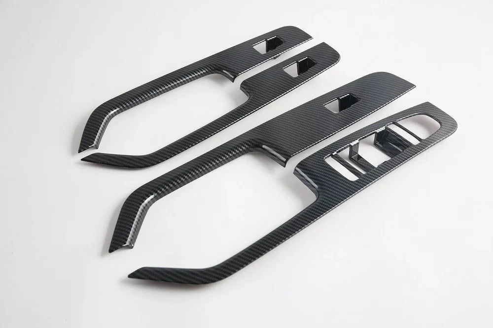 Black carbon fiber texture interior door handle trim covers for BYD car accessories.
