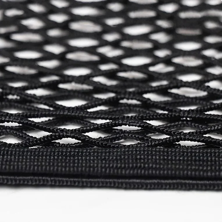 Close-up of a durable black mesh storage net made from high-quality synthetic fabric.