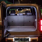 Grey durable custom-fit TPE cargo liner for BYD vehicle trunk, protecting interior surfaces.