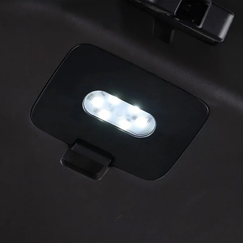 Professional black car interior light with a bright white LED illumination panel.