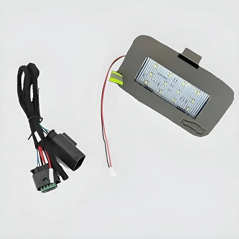 LED interior lighting module with black housing and multi-colored wiring for car electrical upgrades.