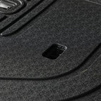 Black textured heavy-duty car trunk mat made of durable, waterproof material.