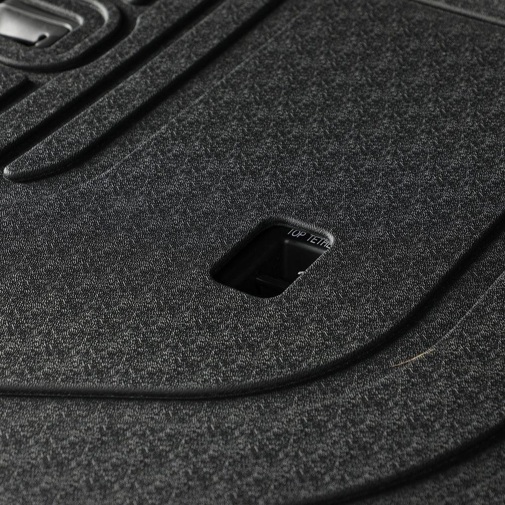 Black textured heavy-duty car trunk mat made of durable, waterproof material.