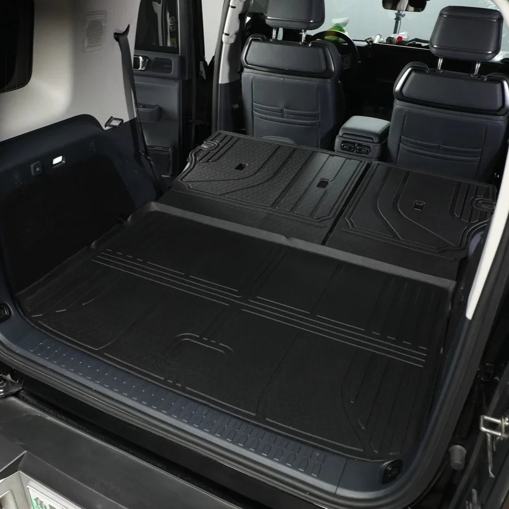 Custom-fit black TPE waterproof trunk mat for BYD, featuring a durable textured non-slip surface.