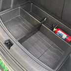 Black heavy-duty rubberized trunk organizer mat with compartments and a red fire extinguisher.