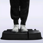 Black heavy-duty TPE car floor mats protecting the vehicle interior from wear and spills.