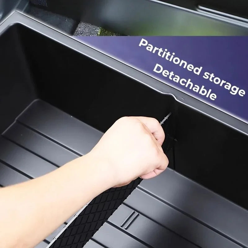Black detachable partitioned storage divider for car trunk organizers.