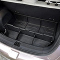 Professional black TPE custom-fit car trunk organizer with multi-compartment storage design.