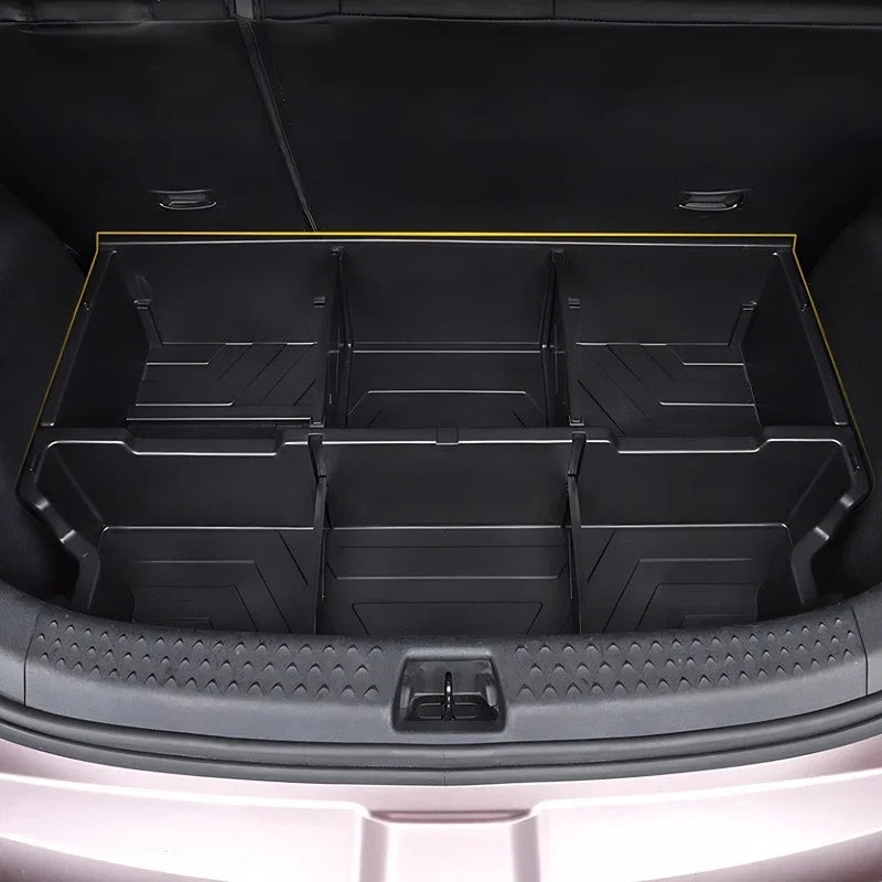 Black durable plastic car trunk organizer with multiple compartments for storage.