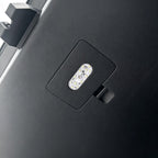 Close-up of a black textured interior trim panel featuring a built-in LED light module.