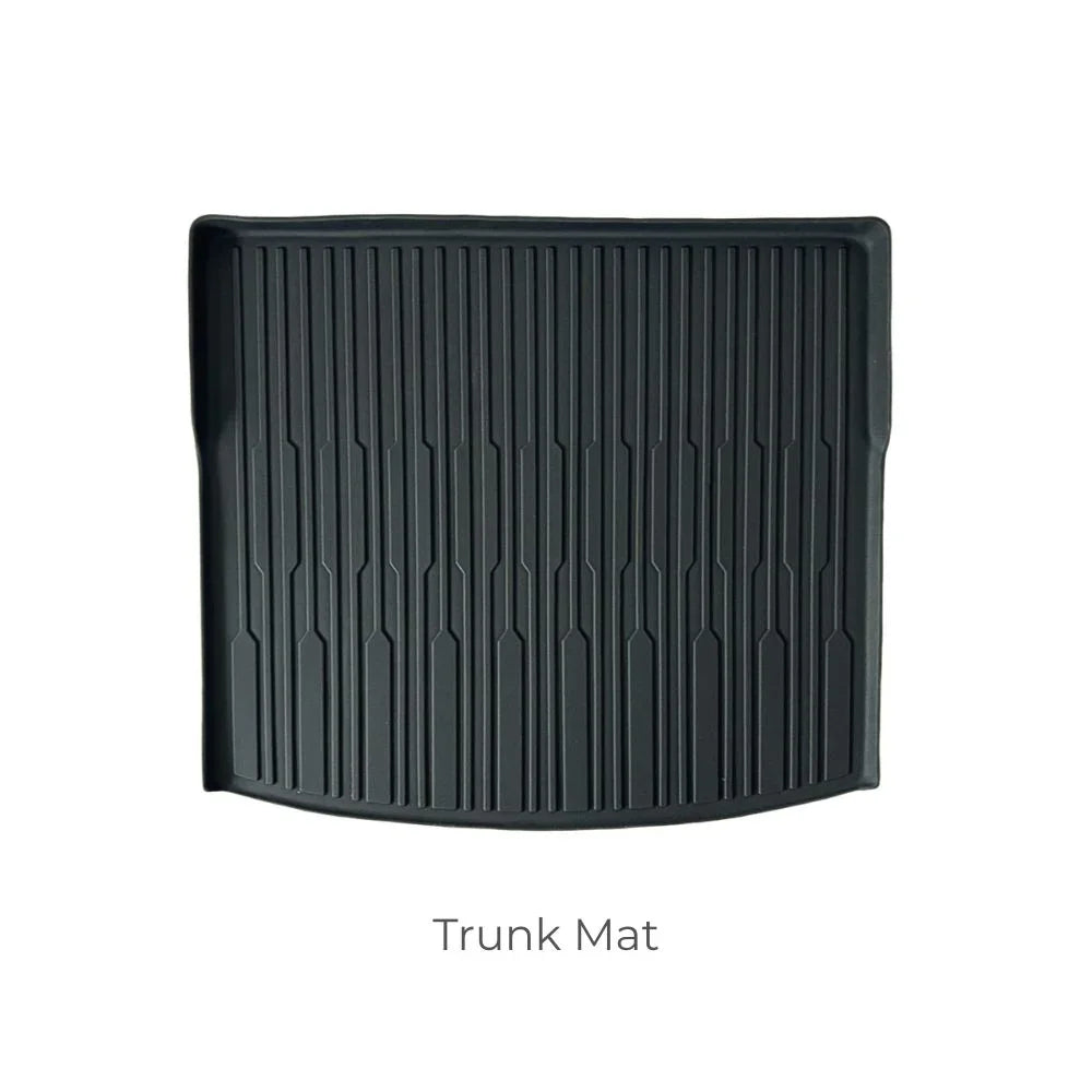 Black heavy-duty rubber trunk mat with vertical anti-slip grooves for durable car protection.