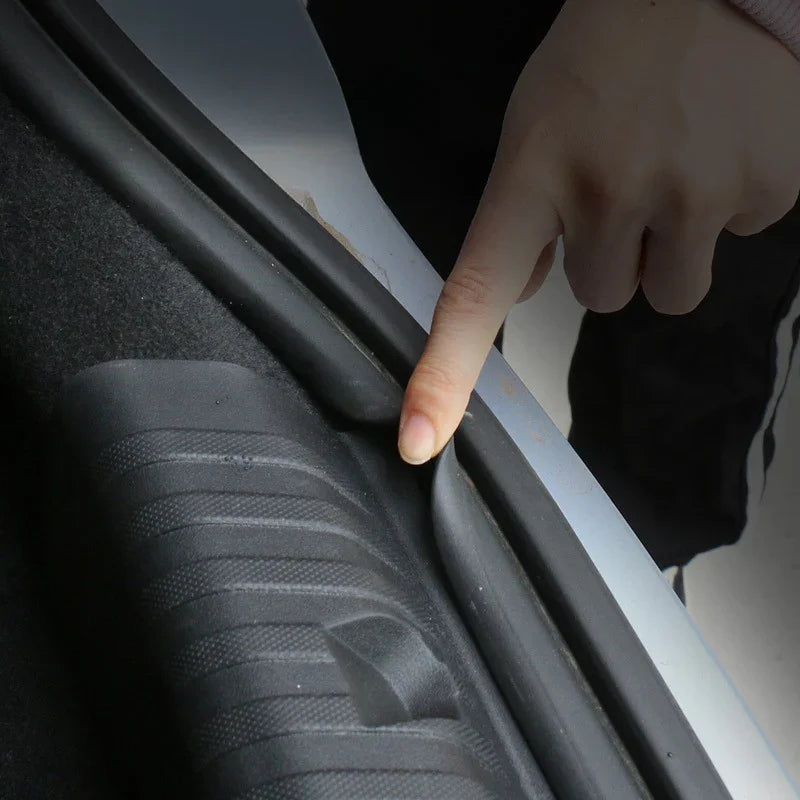 Black heavy-duty rubber trunk edge protector strip for car door seal protection.