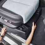 Black durable waterproof side seat protector for BYD car interior with light blue leather seat.