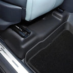 Black textured car floor mat and protective trim for BYD vehicle interior.