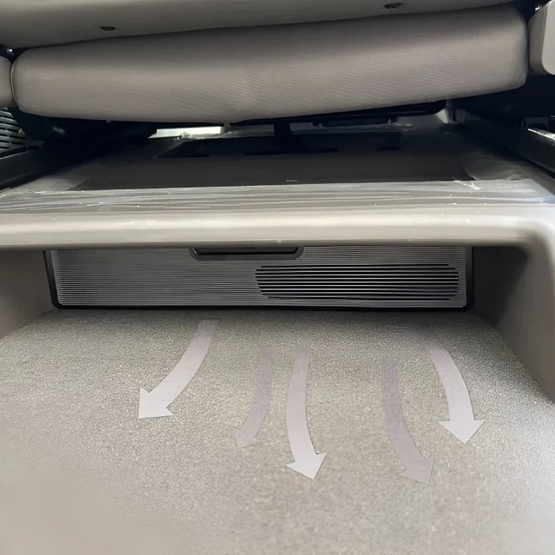 Custom-fit grey carpet trunk liner for BYD with protective non-slip arrows.