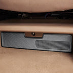 Black textured protective trunk mat installed in a car's cargo area.