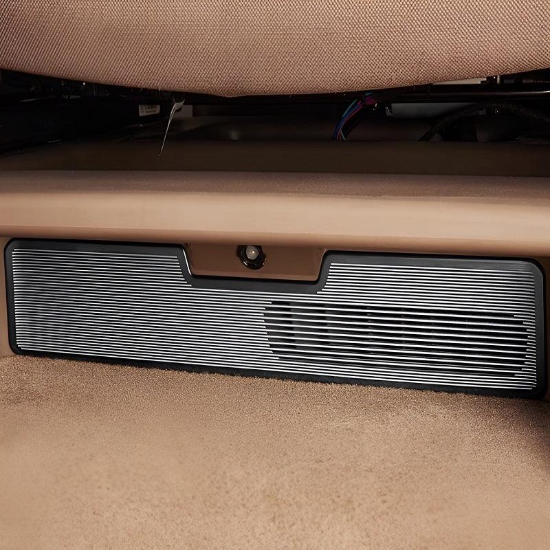Black textured protective trunk mat installed in a car's cargo area.