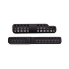 Two matte black plastic slotted ventilation grilles for automotive interior accessories.