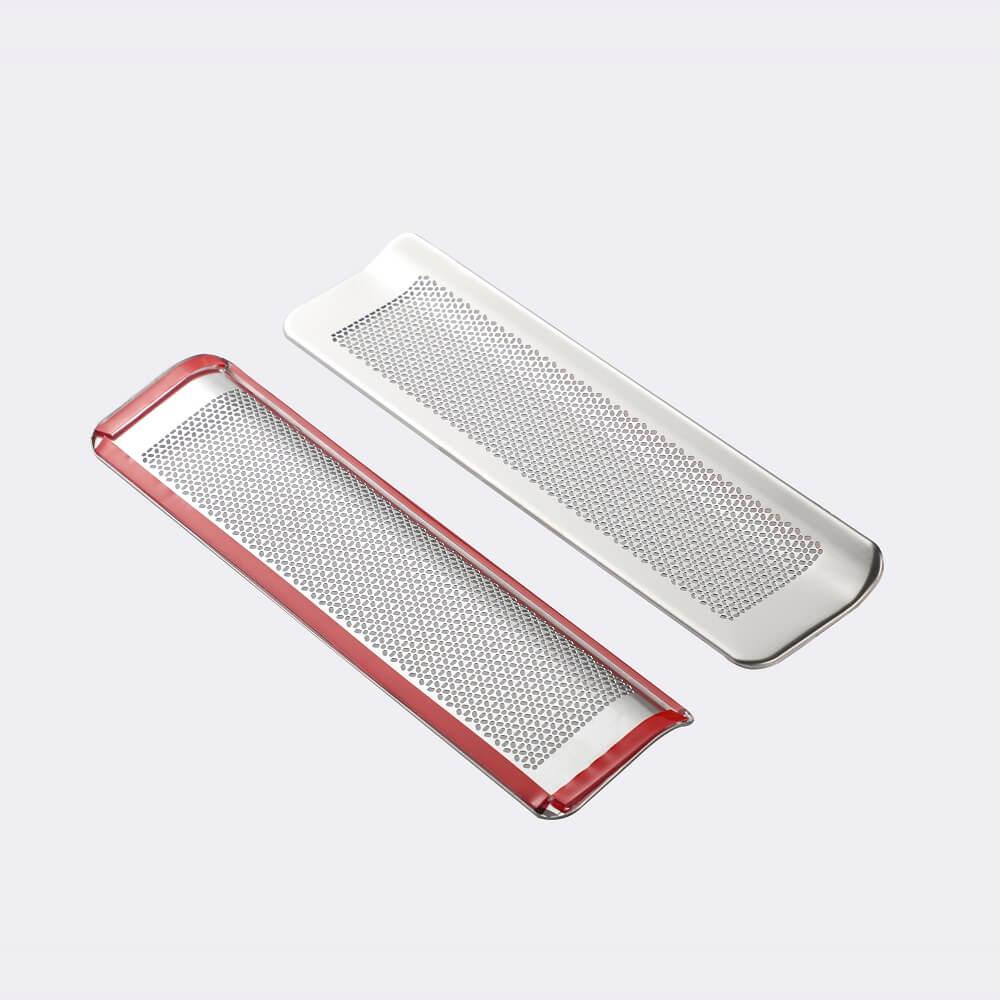 Two rectangular stainless steel graters, one silver and one red, with fine perforated surfaces.