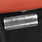 Silver stainless steel decorative trim with a radial perforated pattern on black interior.